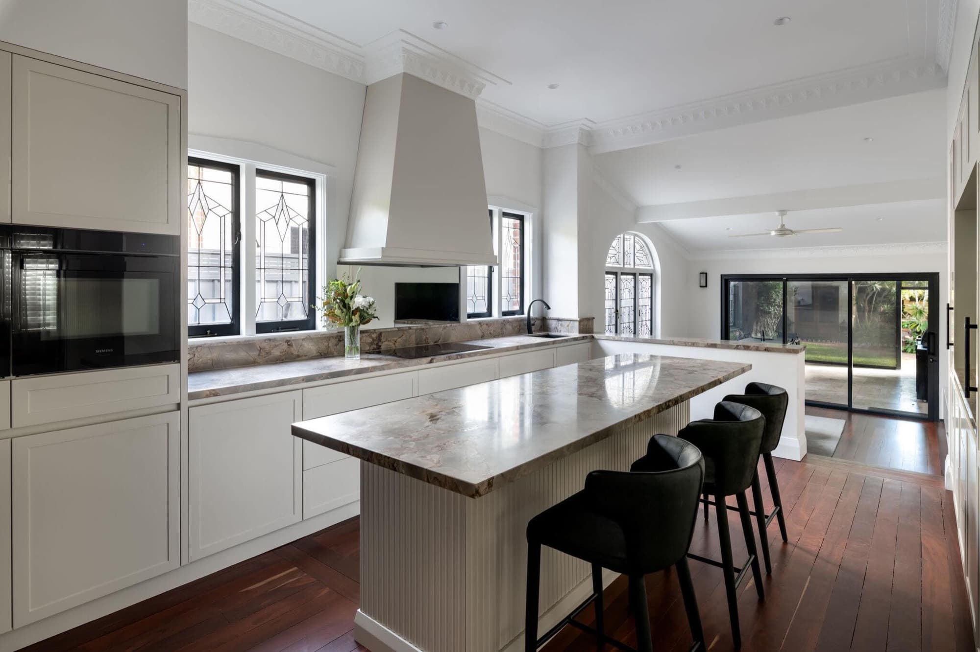 Crisp, freshly painted cornices and ceilings in a character-home kitchen — an example of Brew Painting's finish